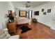 This bedroom offers a cozy atmosphere with terra cotta tile flooring, neutral walls, and a decorative area rug at 10327 Meadow Crossing Dr, Tampa, FL 33647