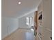 Bright closet space with modern shelving and natural light from the window at 4760 Meredith Ln, Sarasota, FL 34241