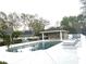 Community pool with ample seating, pool house, and well-maintained surroundings at 8283 47Th Street E Cir, Palmetto, FL 34221