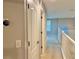 Hallway leading to bedrooms with a thermostat at 8283 47Th Street E Cir, Palmetto, FL 34221