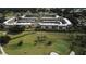 Aerial view of condo community surrounding a golf course, offering a serene and recreational lifestyle at 12300 Vonn Rd # 7203, Largo, FL 33774