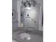 Bathroom featuring granite countertops, a modern sink, and a well-lit mirror at 12300 Vonn Rd # 7203, Largo, FL 33774