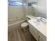 Classic bathroom features tub and shower combination and single sink vanity at 3402 Rankin Dr, New Port Richey, FL 34655