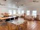 Large recreation room with plenty of seating and tables, perfect for gatherings at 4034 Dream Oak Pl # 104, Tampa, FL 33613