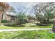 Scenic view of the community pond and picturesque bridge at 7502 Needle Leaf Pl # B66, Tampa, FL 33617