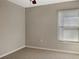 Bedroom with window and carpet flooring at 13507 Willow Bluestar Loop, Riverview, FL 33579