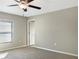 Bedroom with wall to wall carpet, neutral walls, window, and ceiling fan at 13507 Willow Bluestar Loop, Riverview, FL 33579