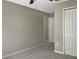 Bedroom with carpet, neutral walls, closet and doorway to bathroom at 13507 Willow Bluestar Loop, Riverview, FL 33579