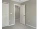 Bedroom with closet and connecting doorway at 13507 Willow Bluestar Loop, Riverview, FL 33579