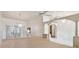 Open living area showcasing high ceilings, large windows, and elegant architectural details at 26058 Paysandu Dr, Punta Gorda, FL 33983