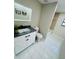 Bathroom featuring a modern vanity, toilet, and bathtub at 9151 Bay Dr, Spring Hill, FL 34606