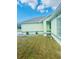 Front yard with green and gray accents at 9151 Bay Dr, Spring Hill, FL 34606