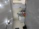 The garage includes new epoxy floors, washer, dryer, and water heater at 9151 Bay Dr, Spring Hill, FL 34606