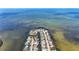Beautiful aerial view of waterfront community, showcasing unique homes and serene waterways at 6417 Driftwood Dr, Hudson, FL 34667