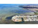 Gorgeous aerial view of waterfront homes with private docks along the bay and canals at 6417 Driftwood Dr, Hudson, FL 34667