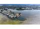 Expansive aerial view of waterfront properties with private canals and lush landscaping at 6417 Driftwood Dr, Hudson, FL 34667