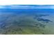 Beautiful view of the ocean from above, displaying the clear blue and turquoise waters at 6417 Driftwood Dr, Hudson, FL 34667