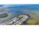 Wide aerial shot showcasing waterfront properties and waterways at 6417 Driftwood Dr, Hudson, FL 34667