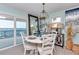 Coastal dining area with table, chairs, and scenic ocean view at 6417 Driftwood Dr, Hudson, FL 34667