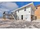 Beautiful exterior of waterfront home featuring a deck with stairs to the main house at 6417 Driftwood Dr, Hudson, FL 34667