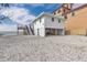 Charming raised beach house featuring stairs to a deck with ocean view and ground level covered parking at 6417 Driftwood Dr, Hudson, FL 34667