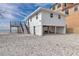 Charming raised beach house featuring stairs to a deck with ocean view and ground level covered parking at 6417 Driftwood Dr, Hudson, FL 34667