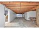 Spacious open-air garage with a picnic table and beach views at 6417 Driftwood Dr, Hudson, FL 34667