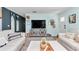 Stylish living room featuring a cozy sofa, decorative console, and chic decor creates a welcoming atmosphere at 6417 Driftwood Dr, Hudson, FL 34667
