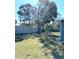 Fenced backyard with lush lawn, great for outdoor activities at 814 20Th Sw St, Largo, FL 33770