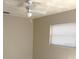 Bedroom featuring a ceiling fan, window with blinds, and neutral-colored walls at 814 20Th Sw St, Largo, FL 33770