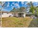 Spacious backyard featuring a screened lanai, perfect for outdoor living and entertaining at 5350 47Th N Ave, St Petersburg, FL 33709