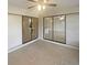 Sunroom with a concrete floor and sliding glass doors at 8379 Begonia St, Spring Hill, FL 34608