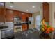 Beautiful kitchen showcasing stainless steel appliances and granite countertops at 10917 Brickside Ct, Riverview, FL 33579