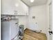 Utility room with laundry hookups and ample storage space at 2117 W Paris St, Tampa, FL 33604