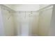 Walk-in closet with wire shelving system for organized storage and convenience at 2850 Somerset Park Dr # 201, Tampa, FL 33613