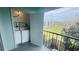 Condo patio with laundry closet featuring a washing machine and dryer at 2850 Somerset Park Dr # 201, Tampa, FL 33613
