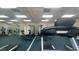 View of the gym equipment reflected in a mirrored wall at 2856 Somerset Park Dr # 102, Tampa, FL 33613
