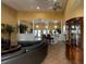 Community lobby with tile floors, high ceilings, columns and a seating area at 2856 Somerset Park Dr # 102, Tampa, FL 33613