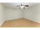 Empty bedroom showing wood-look floors and a ceiling fan, ready for a new owner to decorate at 408 43Rd Street W Blvd, Palmetto, FL 34221