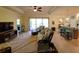 Spacious living room with open floor plan, sliding doors to patio at 20590 Granlago Dr, Venice, FL 34293