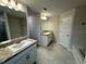 Modern bathroom with double vanity, soaking tub, and shower at 13009 Parade Ave, Weeki Wachee, FL 34614