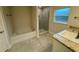 Clean bathroom with a garden tub, a separate shower, and a vanity at 13009 Parade Ave, Weeki Wachee, FL 34614