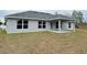 Newly built home with covered patio and spacious backyard at 13106 Nusser Ave, Weeki Wachee, FL 34614
