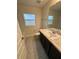 Bathroom with single sink, shower/tub combo and tile floor at 5356 Frost Rd, Spring Hill, FL 34606