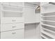 Spacious walk-in closet with ample shelving and hanging space at 19617 Sunset Bay Dr, Land O Lakes, FL 34638