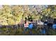 Aerial view showcasing waterfront property with multiple docks at 8531 Bass Lake Dr, New Port Richey, FL 34654