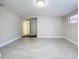 Spacious bedroom with neutral walls and tile flooring at 8531 Bass Lake Dr, New Port Richey, FL 34654