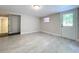 Bright bedroom with tile floors and access to exterior at 8531 Bass Lake Dr, New Port Richey, FL 34654