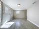Versatile bonus room with tile floor and exterior access at 8531 Bass Lake Dr, New Port Richey, FL 34654