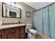 Clean bathroom with granite vanity and shower at 1228 Cord Grass Ct, Wesley Chapel, FL 33543